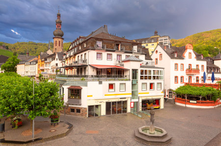 Historic market square with fountain and tower in Cochem, Germanyの写真素材