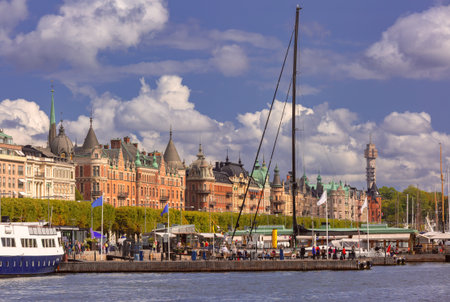 Historic buildings and boats along Strandvagen waterfront in Stockholm, Swedenの写真素材