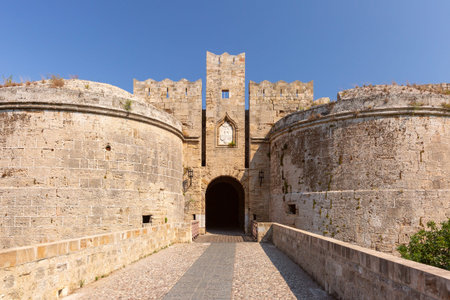 View of the Gate d Amboise with stone walls and arched entrance in the old town of Rhodes city,...