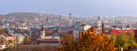Autumn panoramic view of Lviv, Ukraine, showing historical skyline and colorful foliageの写真素材