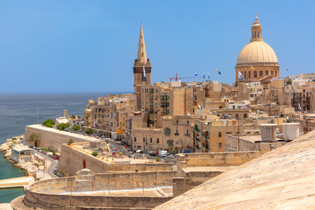 Panoramic cityscape of Valletta Malta featuring the dome of Our Lady of Mount Carmel and Saint Pauls...