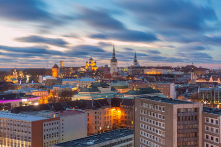 Alexander Nevsky Cathedral and city churches lit by sunrise in Tallinn, Estoniaの写真素材