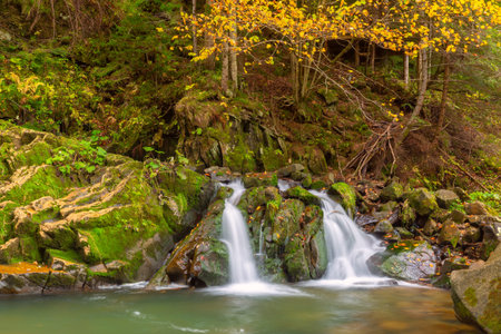 Kamianka Waterfall in Skole Beskids National Park near Skole town, Lviv region, Ukraine, in autumnの写真素材