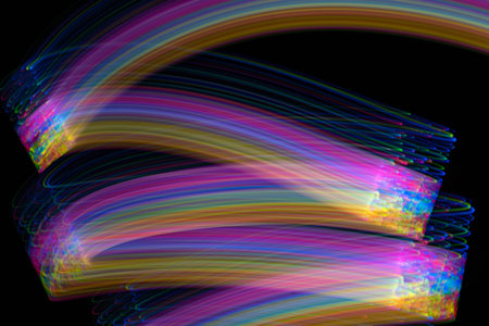 multi colored colorful neon light painting photography, long exposure, ripples and waves against on...