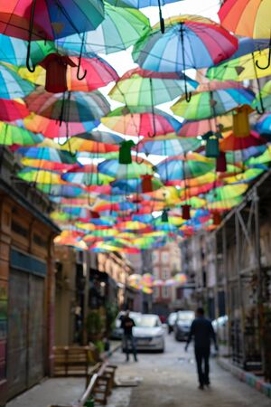 blurred defocused Background colorful rainbow different color umbrellas. unban tourist street decoration. Istanbul, Karakoy. travel summer conceptの写真素材