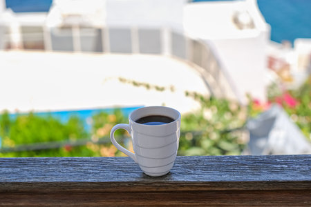 coffee cup coffee cups in wooden balcony terrace with sea view