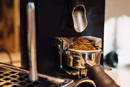 close up of ground coffee bean in coffee brewed machineの写真素材