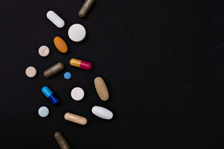 Close-up colorful powder soft capsules pill vitamin supplements