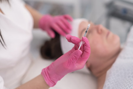 Experience the magic of beauty injections with biorevitalization procedures. Watch as a skilled cosmetologist performs skin-refreshの写真素材