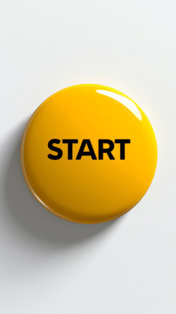 yellow 'Start' button with a sleek design on neutral background, initiation and readiness.の素材