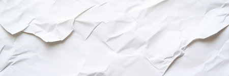 Crumpled white paper provides a textured and abstract backdrop, suitable for various design applications, showcasing its unique folds and creasesの素材