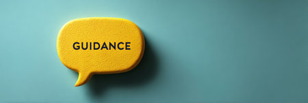 Yellow textured speech bubble displaying the word guidance in black letters, representing advice, help, and important communication on a teal blue background with copy spaceの素材