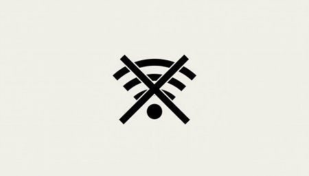 Wi fi signal icon with a cross overlay indicating lost connection, offline status or network outage, symbolizing technical issues, service disruption and no internet accessの素材
