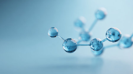 Molecular structure floating in a light blue environment, representing biotechnology, chemistry, and health care concepts with its interconnected spheres and glossy elementsの素材
