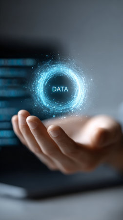 Businessman is holding a futuristic glowing circular symbol with the word data in his hand, representing innovation, technology, and data management in the digital ageの素材