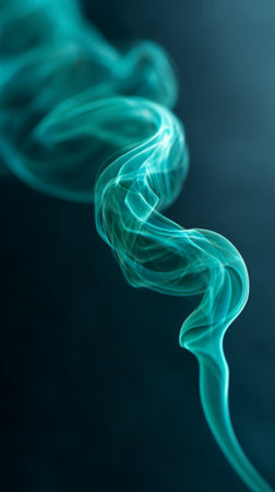 Teal colored smoke flowing and swirling in graceful, abstract shapes against a dark gradient background, illustrating movement, mystery, and dynamic energyの素材