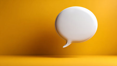 White 3d speech bubble floating on vibrant yellow studio background, minimalist icon for communication, chat, dialogue, idea sharing, messaging, support and digital networkingの素材