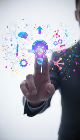 Business person touching a glowing lightbulb generating a burst of colorful innovation icons, representing creativity, inspiration, and technology in developmentの素材