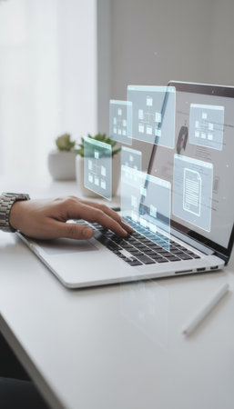 Persons hand interacting with a laptop, managing a futuristic digital interface displaying data flowcharts, file documents, and hierarchical organization for business workflow optimizationの素材