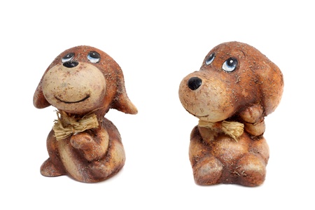 Two smiling ceramic dogs の写真素材