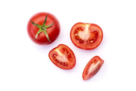 top view of whole and sliced ââtomato isolated on white backgroundの写真素材