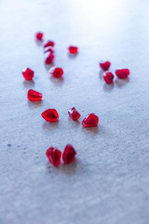 pomegranates on the dining table. pomegranate seeds on a table