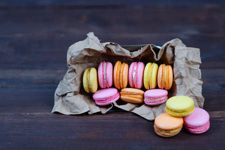 macaroni cake box on dark wooden backgroundの写真素材