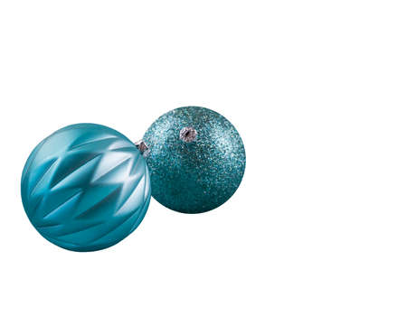 isolated light blue turquoise christmas ornamentsの写真素材
