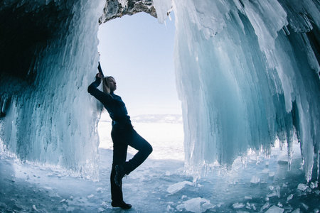 Man in an ice cave on Baikal