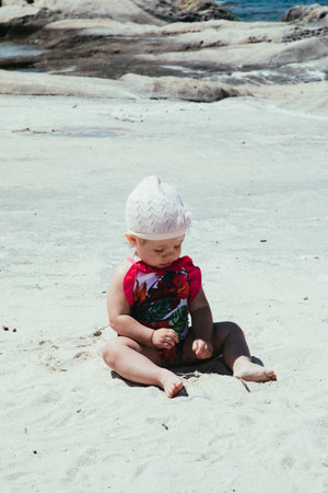 Little girl on Vourvourou beach in Greeceの写真素材