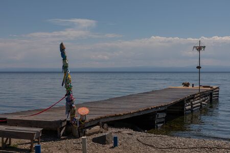 Pier against the background of the horizon of Lake Baikalの写真素材