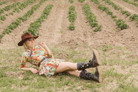 Cowboy girl in the field