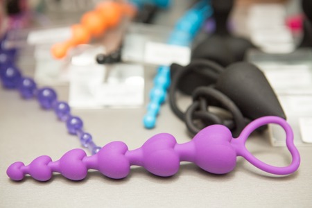 sex toys on a glass display in the storeの写真素材