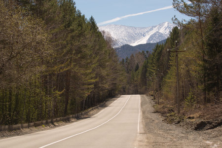 Road leading to snowy mountain