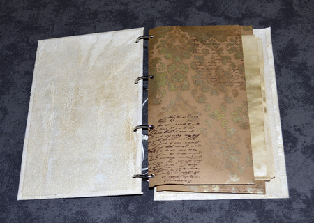 Notebook with meaningless imitation of handwritten pattern, handmade by myselfの写真素材