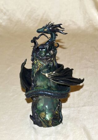 Black, green and gold dragonの写真素材