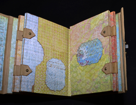 The third spread of a small old-looking photoalbumの写真素材