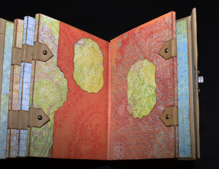 Fourth spread of a small old-looking photoalbumの写真素材