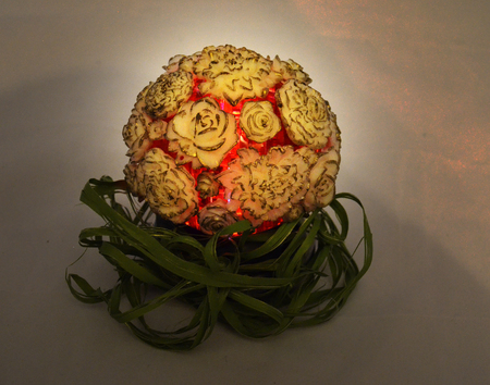 Old-looking night-light lamp with flowersの写真素材