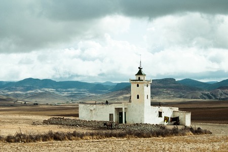 Local mosque near Mrirt on the background of Middle Atlas mountains, Khenifra province, Moroccoの写真素材