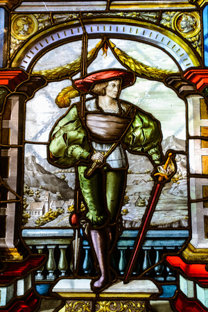 SINAIA, ROMANIA - AUGUST 20, 2014: The interior of beautiful Neo-Renaissance Peles palace castle in Carpathian mountains, built between 1873 and 1914 for King Carol I. The stained glassesのeditorial素材