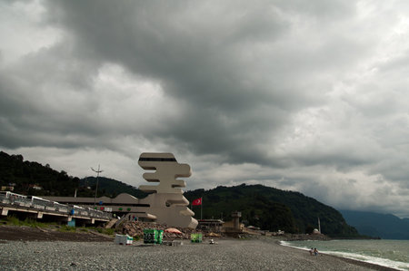 SARPI, GEORGIA - August 20, 2012: People having rest at Georgian Black Sea coast beach with Georgia...