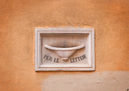 ancient marble letter-hole in Florence, Italyの写真素材