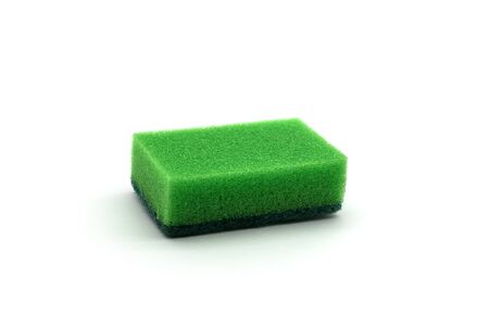 Green dish washing sponge on a white backgroundの写真素材