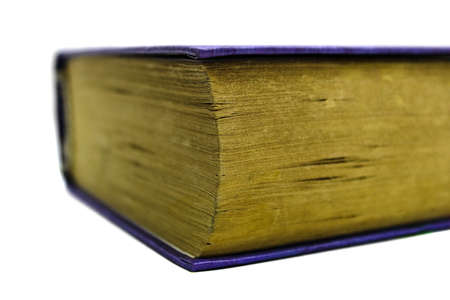 Old book close up isolated on a white backgroundの写真素材