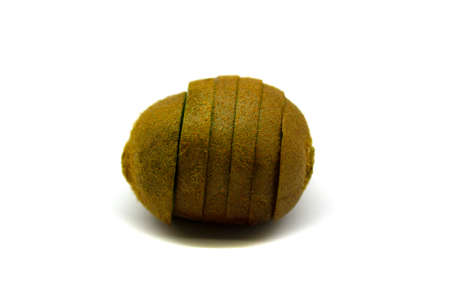 Kiwi berry cut into slices close up isolated on a white backgroundの写真素材