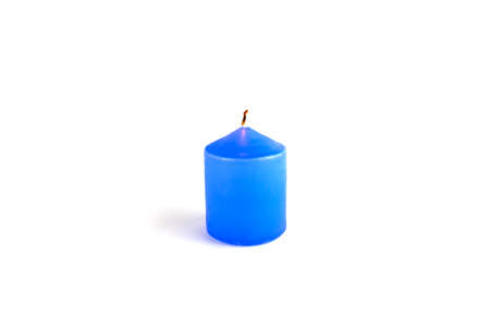 Extinguished blue candle isolated on a white backgroundの写真素材