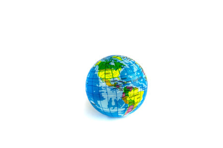 Globe of the world in close-up, isolated on a white background