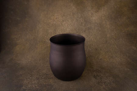 old vase close-up on dark backgroundの写真素材