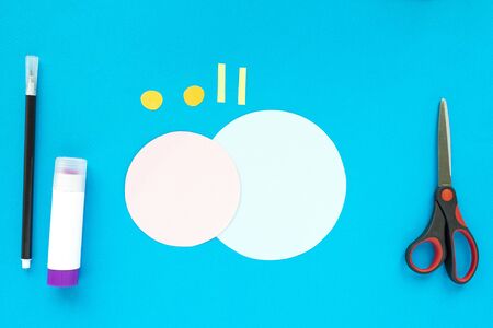 Step by step children's cardboard crafts - colored swinging snail. Scissors, glue, paper sheets. Set for kids art. Children activity in kindergarten, school, at home. Step 1.の写真素材